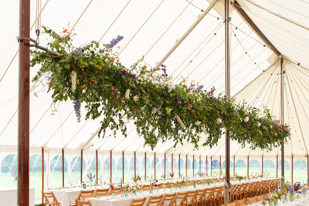 A huge suspended floral garland by Moat Farm Flowers showcases the impact of working with British flowers and foliage on a large scale