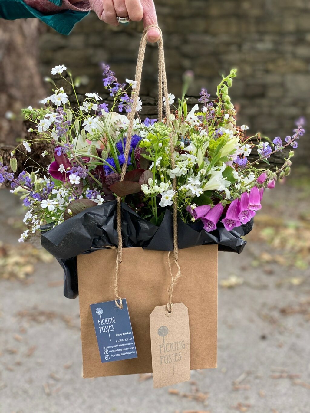 Posies of British cut flowers gathered in a small gift bag ready for local delivery by Becky of Picking Posies, Lancashire.